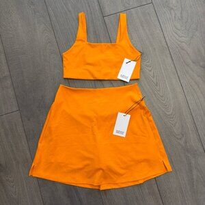 *NWT* Girlfriend Collective Orange Matching Skort & Bra Set